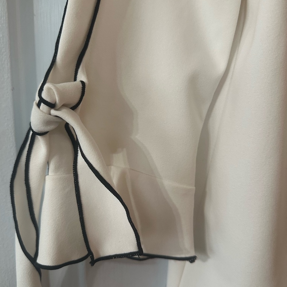 Chico's Cream Blouse with Black Piping Ruffled Tie-Sleeves. Size medium. - Picture 2 of 8